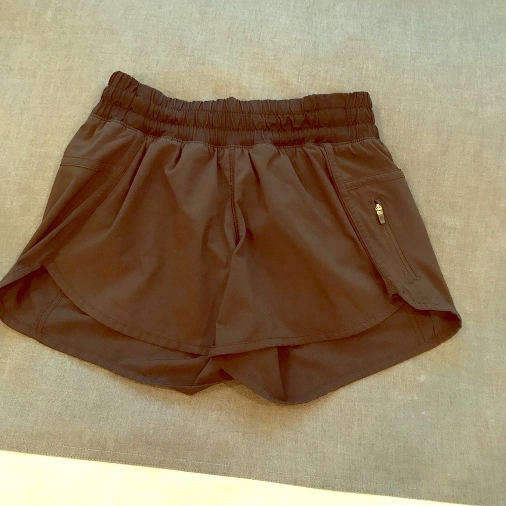 Black lululemon running shorts with pocket. Size 4